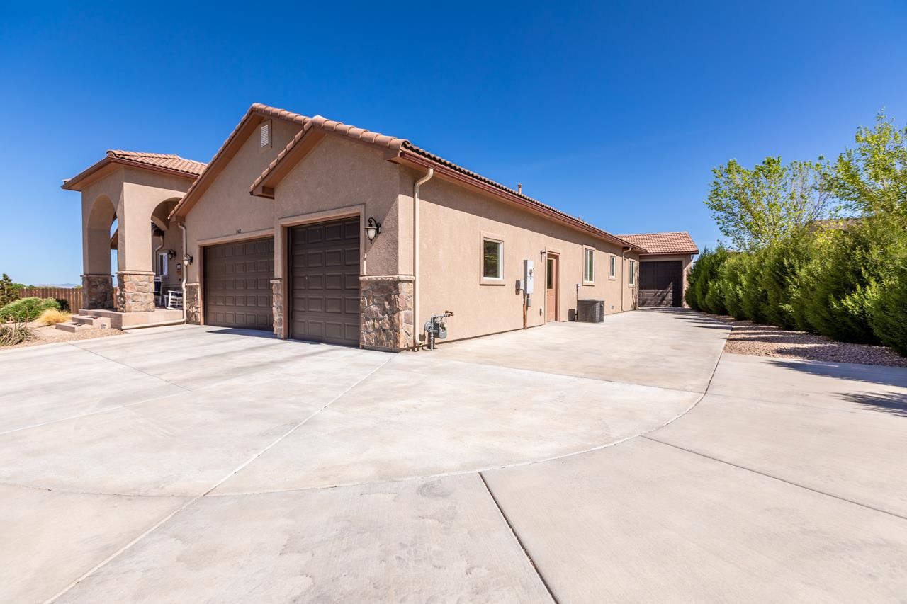 962 Hickory Street Fruita, CO 81521 - Photo 2 of 35 a view of a house with a yard