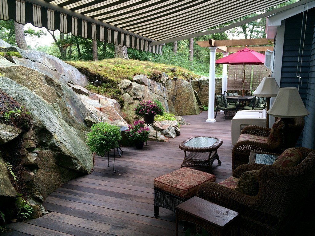 a view of a patio with furniture