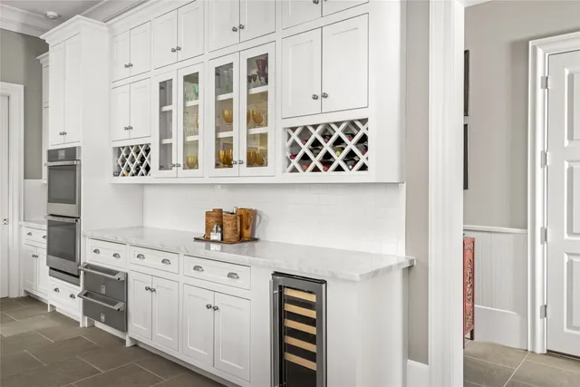a utility room with window dryer and washer