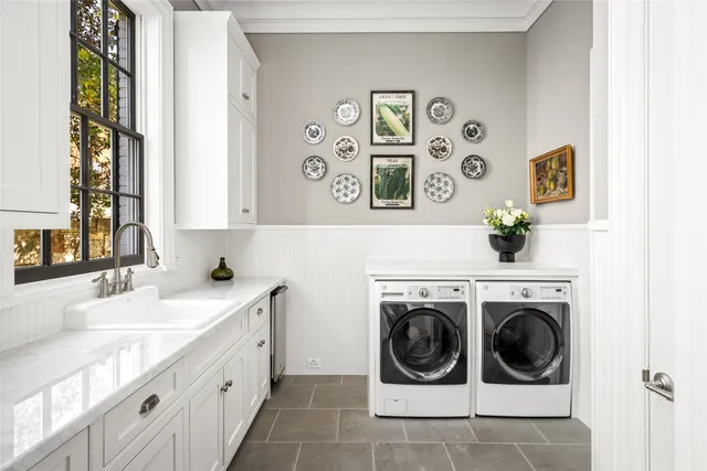 a bathroom with a bathtub and a sink