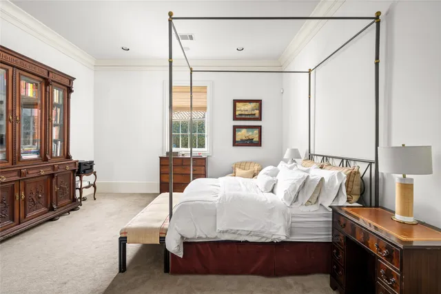 a bathroom with a window and a shower