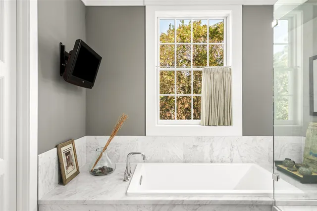 a living room with furniture or window and a wooden floor