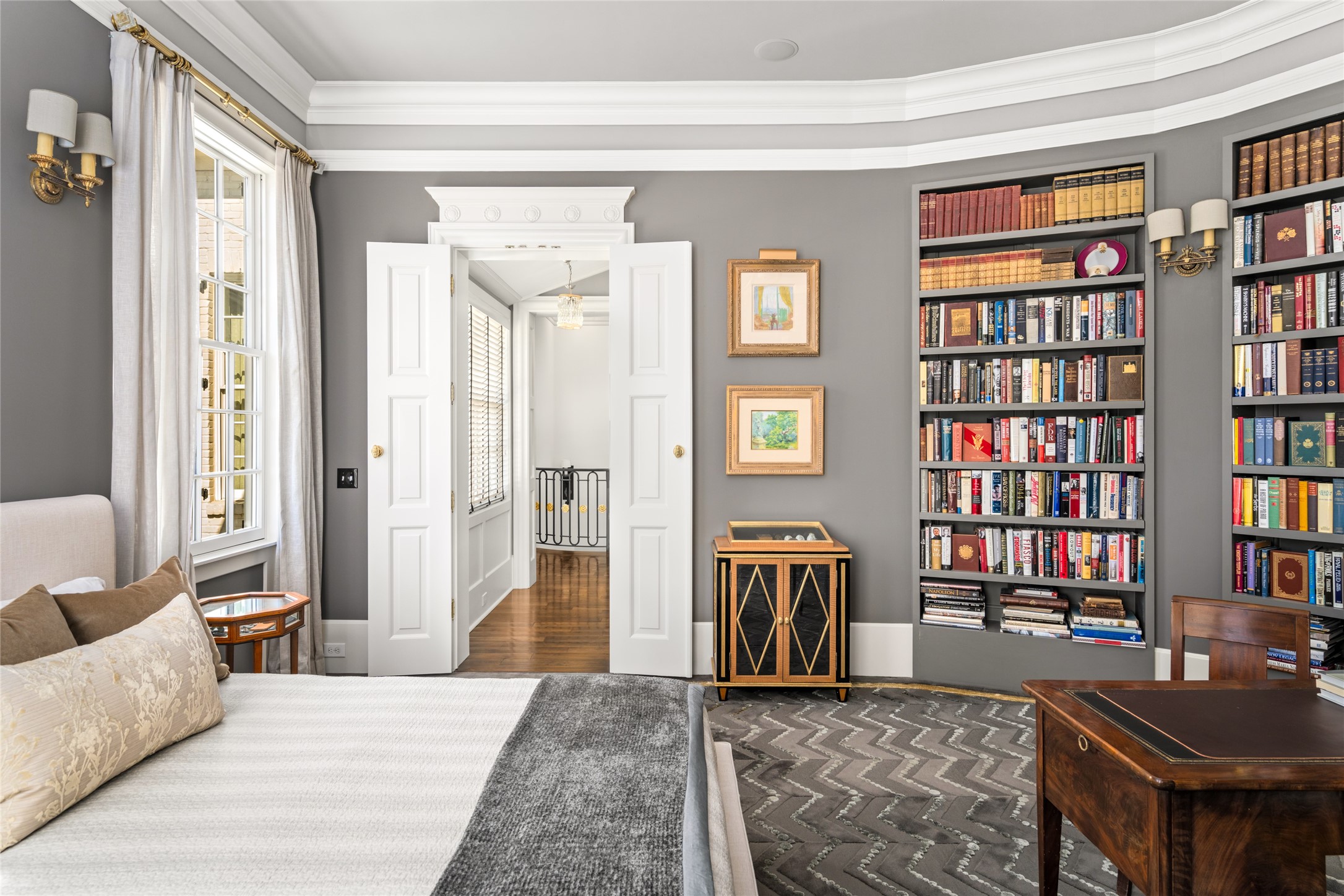 6024 Memorial Drive Houston, TX 77007 - Photo 38 of 46 a bedroom with furniture and a book shelf
