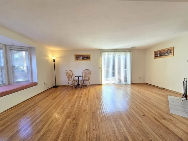 a view of livingroom with hardwood floor and window