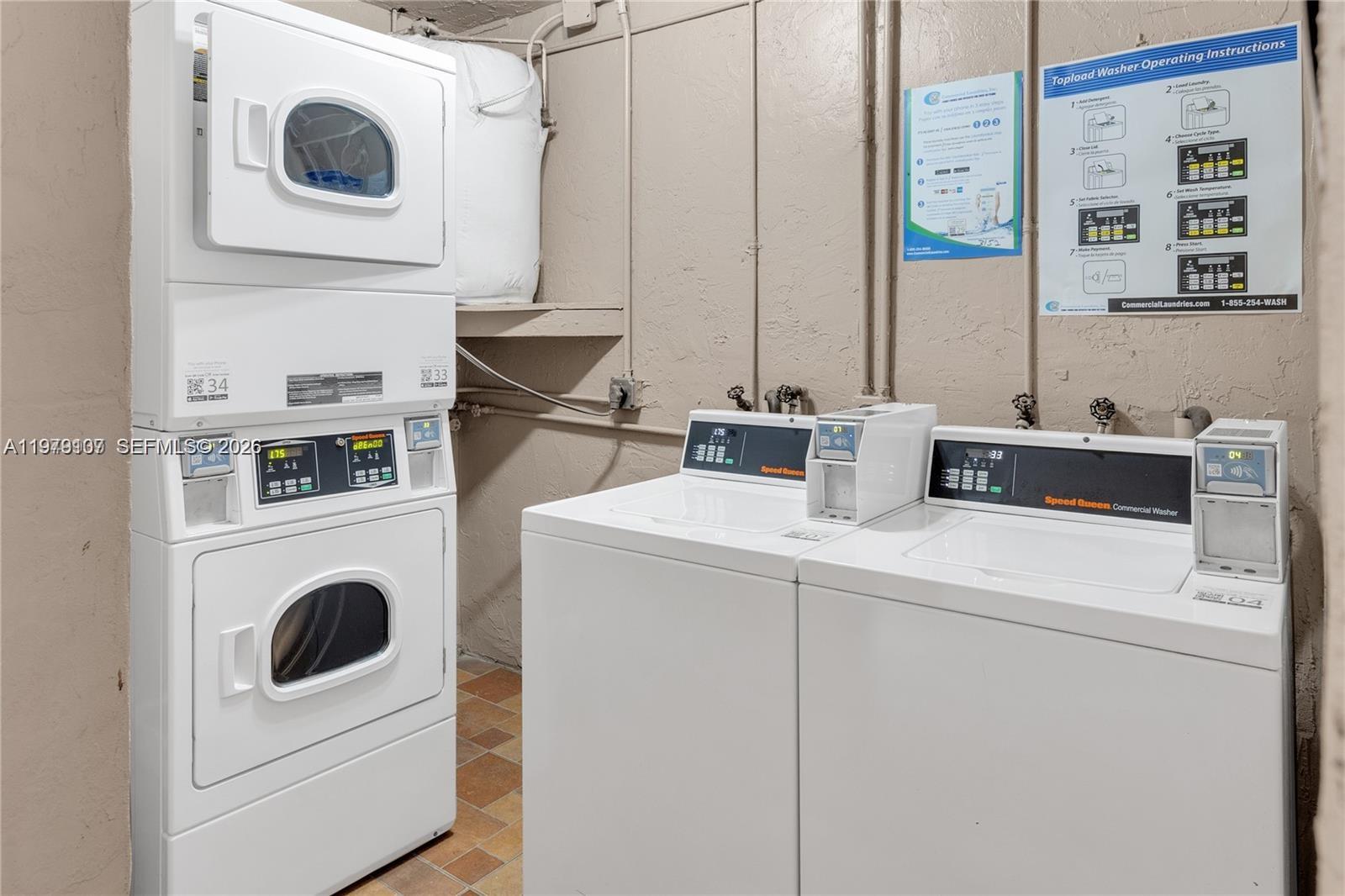 11273 Southwest 88th Street, Unit 114J Miami, FL 33176 - Photo 13 of 19 a utility room with dryer and washer
