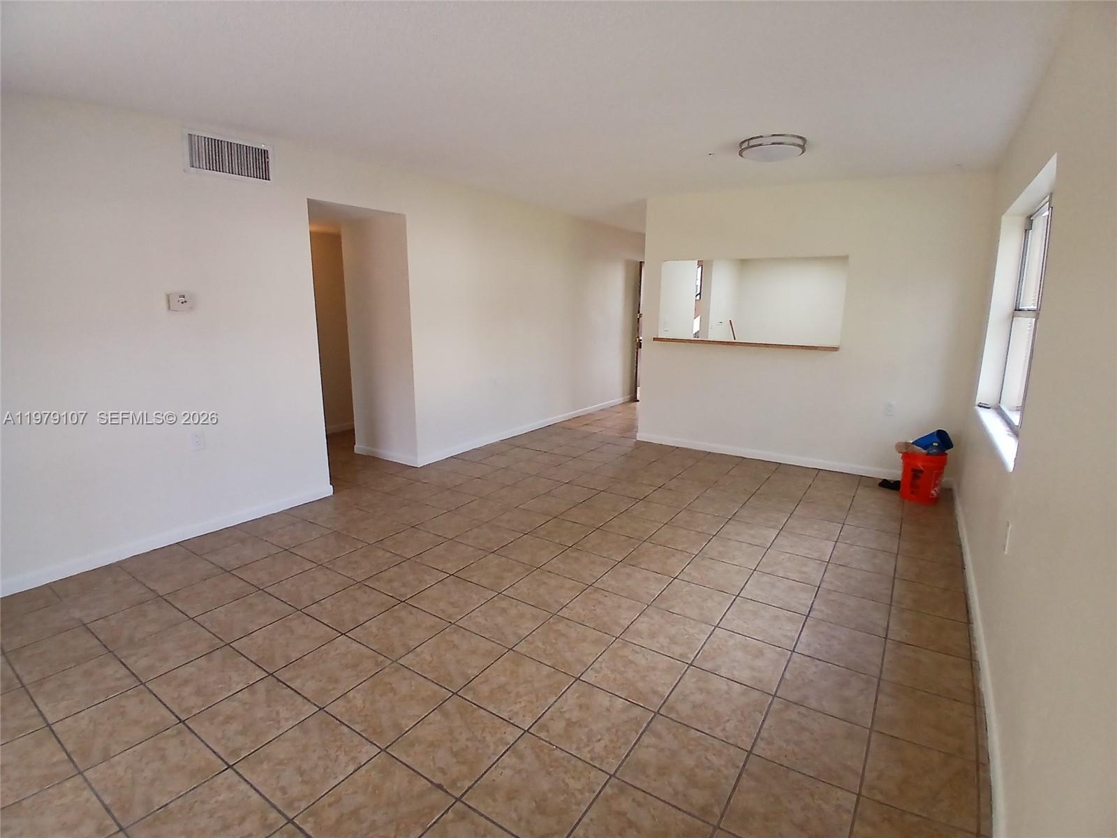 11273 Southwest 88th Street, Unit 114J Miami, FL 33176 - Photo 6 of 19 a view of an empty room