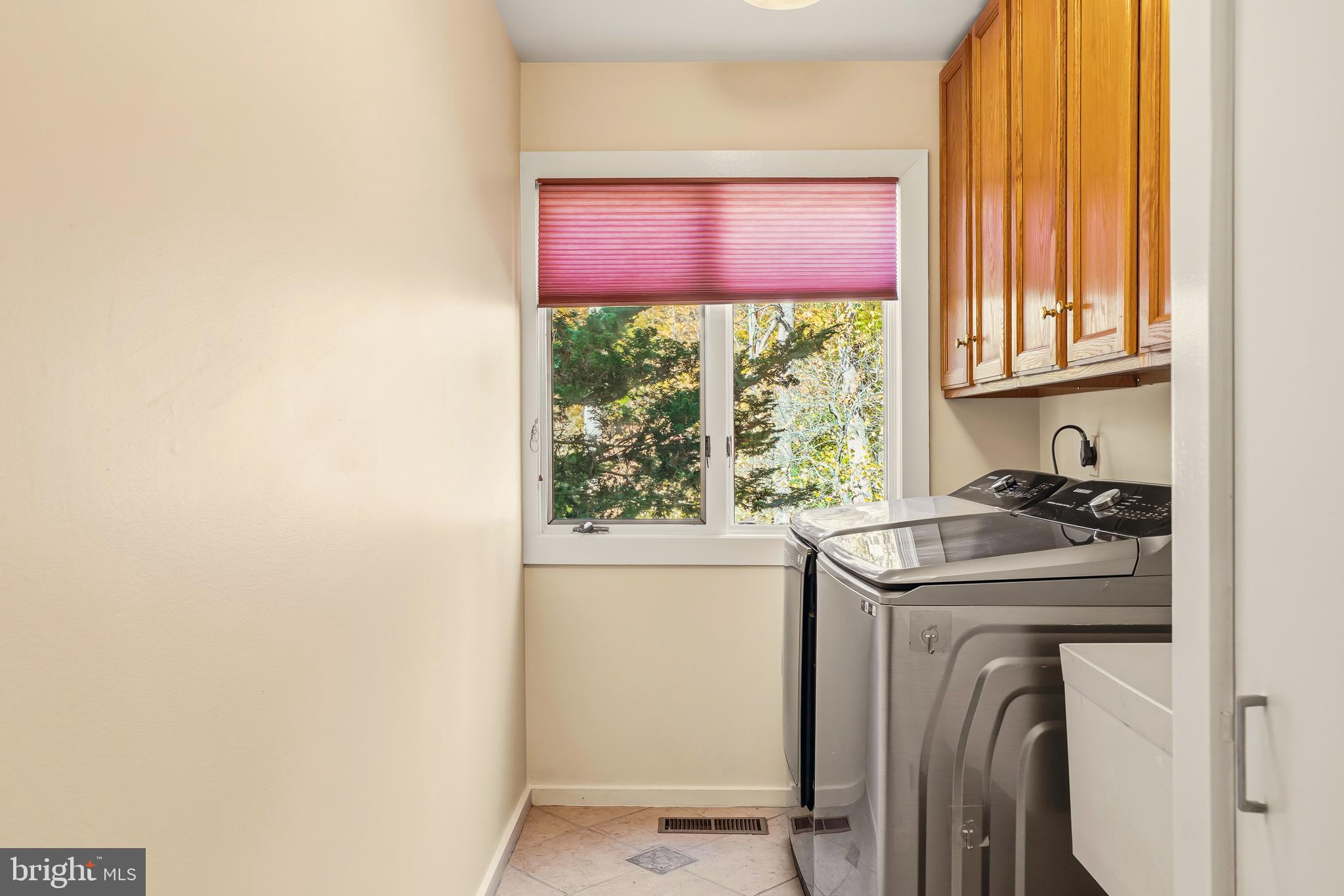 2 Riderwood Station Towson, MD 21204 - Photo 21 of 58 a utility room with dryer and washer