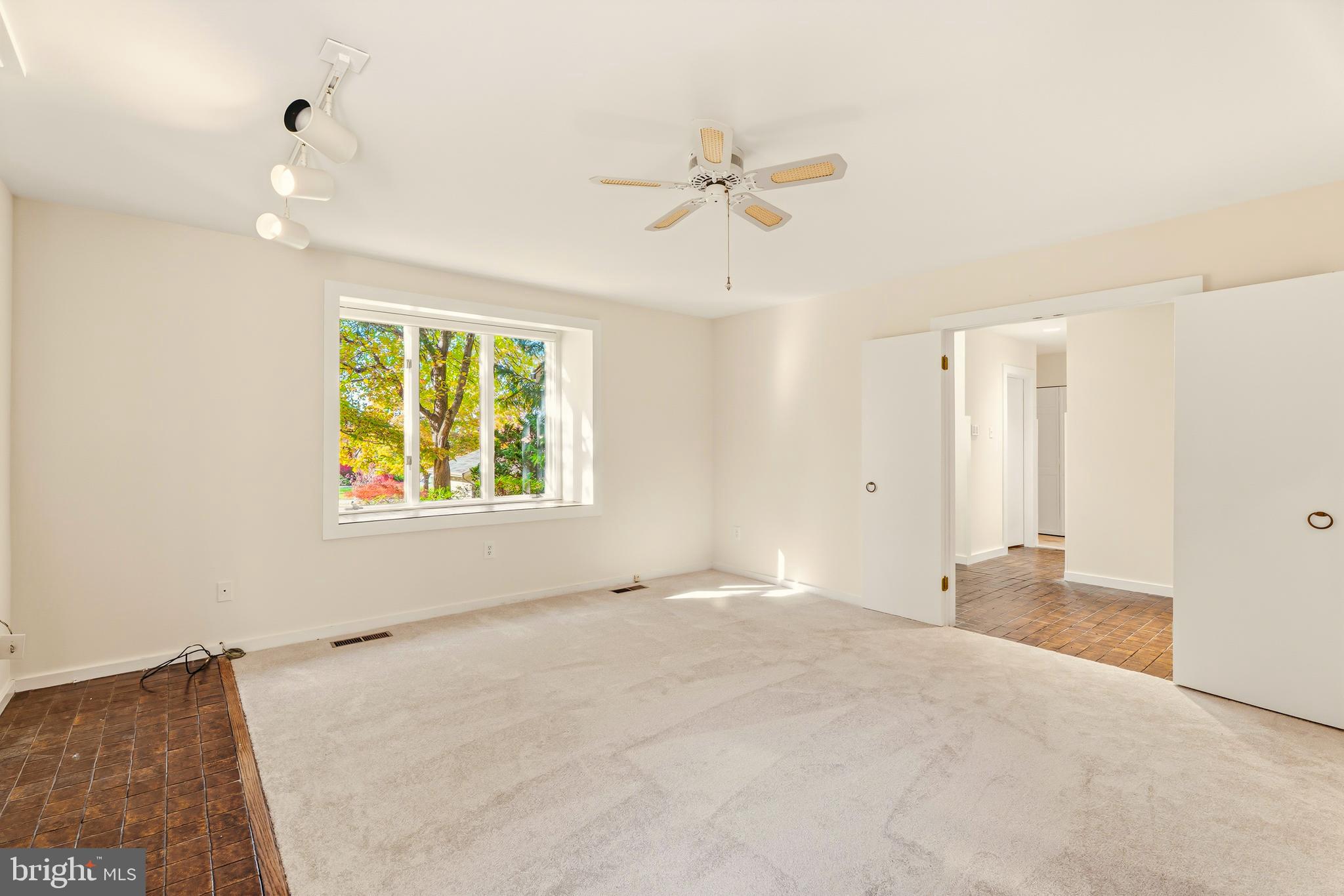 2 Riderwood Station Towson, MD 21204 - Photo 26 of 58 an empty room with windows and fan