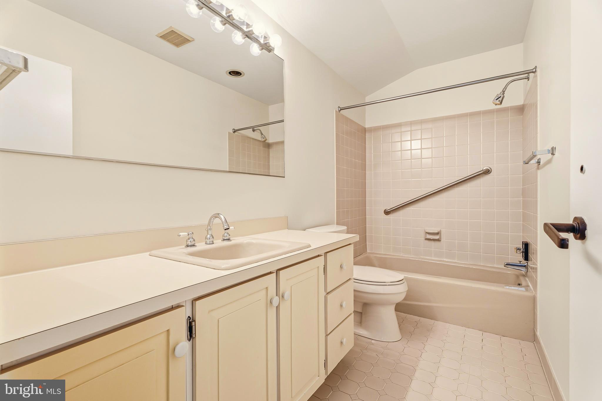 2 Riderwood Station Towson, MD 21204 - Photo 42 of 58 a bathroom with a sink a toilet and shower