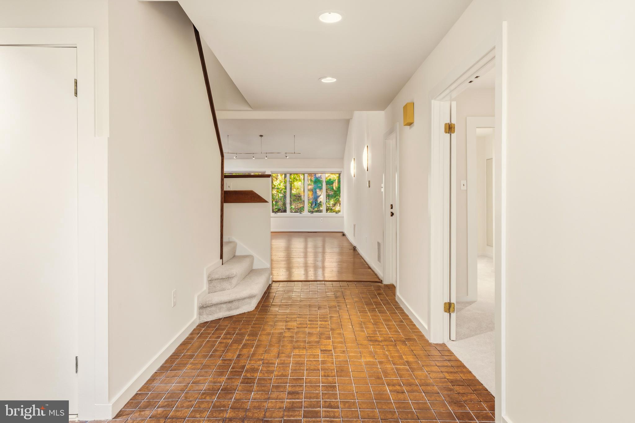 2 Riderwood Station Towson, MD 21204 - Photo 5 of 58 a view of entryway with wooden floor