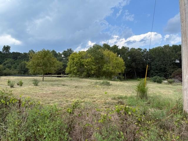 883 Harris Lord Cemetery Road Commerce, GA 30530 - Photo 7 of 17 a backyard of a house with lots of green space