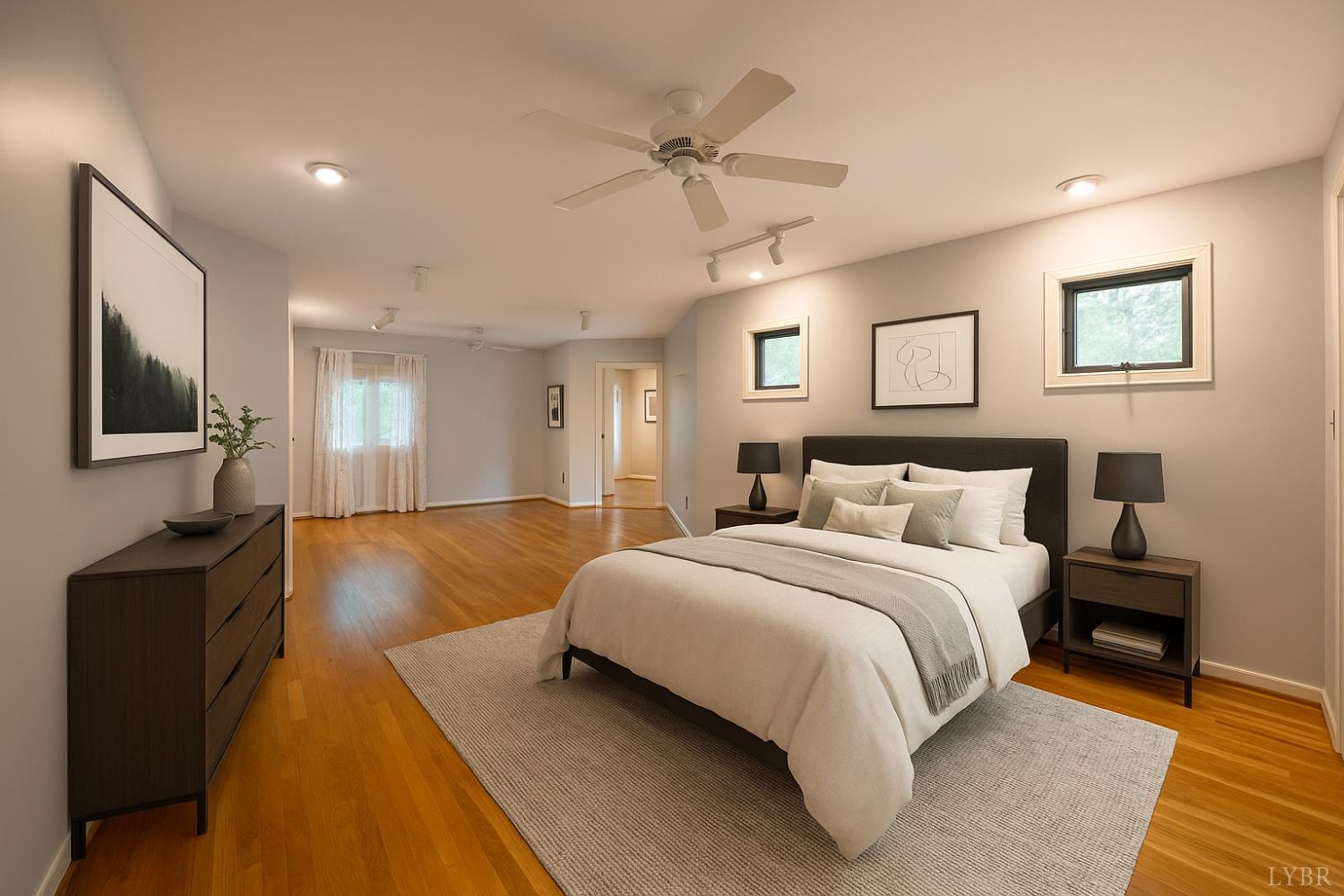 2246 Country Club Road Appomattox, VA 24522 - Photo 20 of 41 a spacious bedroom with a bed and a flat screen tv