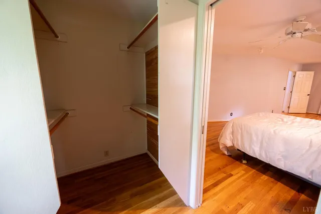 a large bathroom with a large tub shower and sink