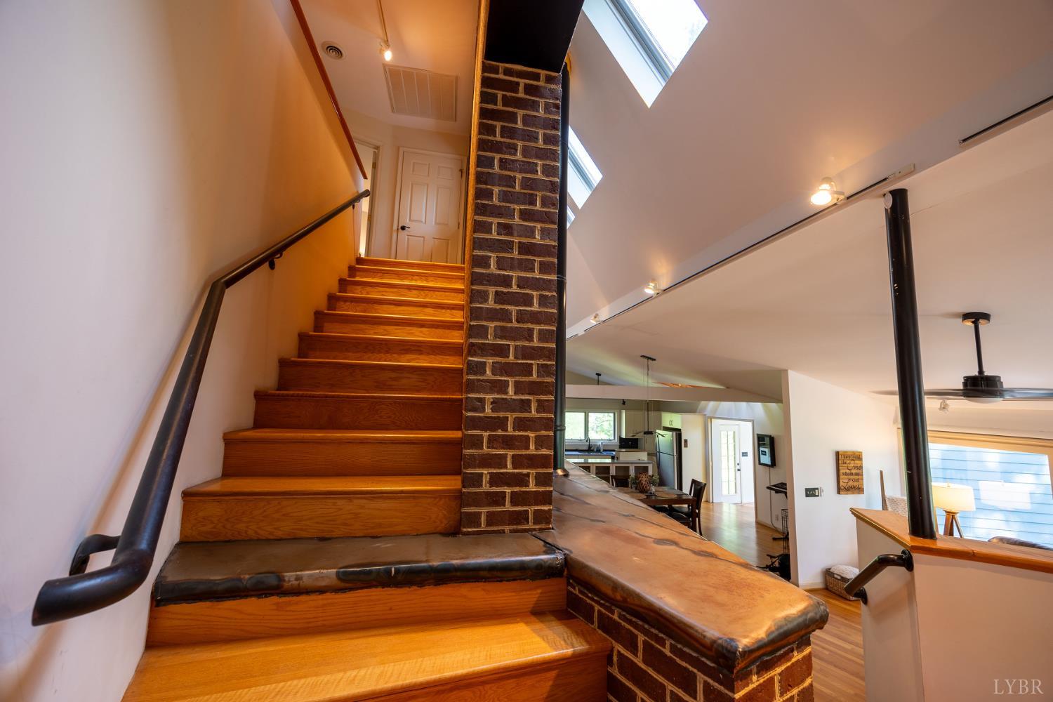 2246 Country Club Road Appomattox, VA 24522 - Photo 28 of 41 a room with stairs and furniture