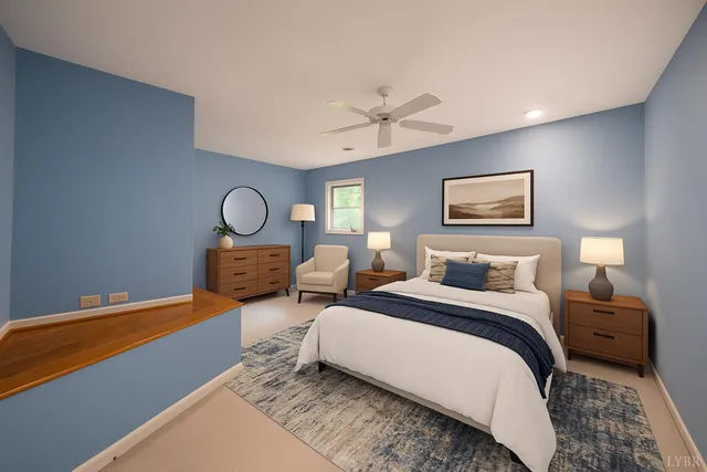 a bedroom with a bed and a lamp