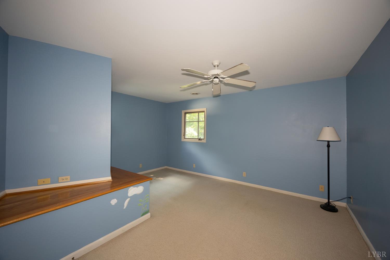 2246 Country Club Road Appomattox, VA 24522 - Photo 34 of 41 an empty room with windows and fan