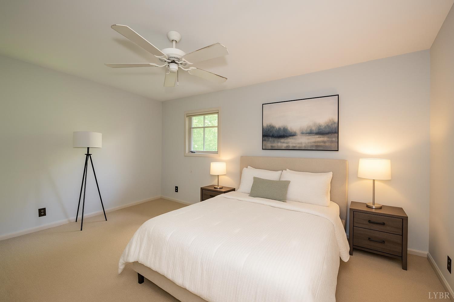 2246 Country Club Road Appomattox, VA 24522 - Photo 36 of 41 a bedroom with a bed and a lamp