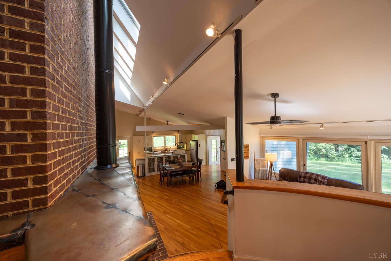 2246 Country Club Road Appomattox, VA 24522 - Photo 6 of 41 a view of a living room with furniture and a floor to ceiling window