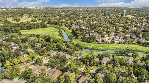 an aerial view of residential house with outdoor space