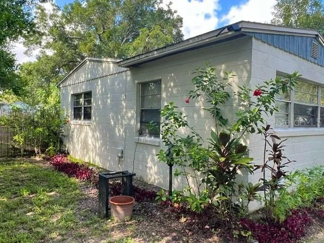 a backyard of a house with lots of green space