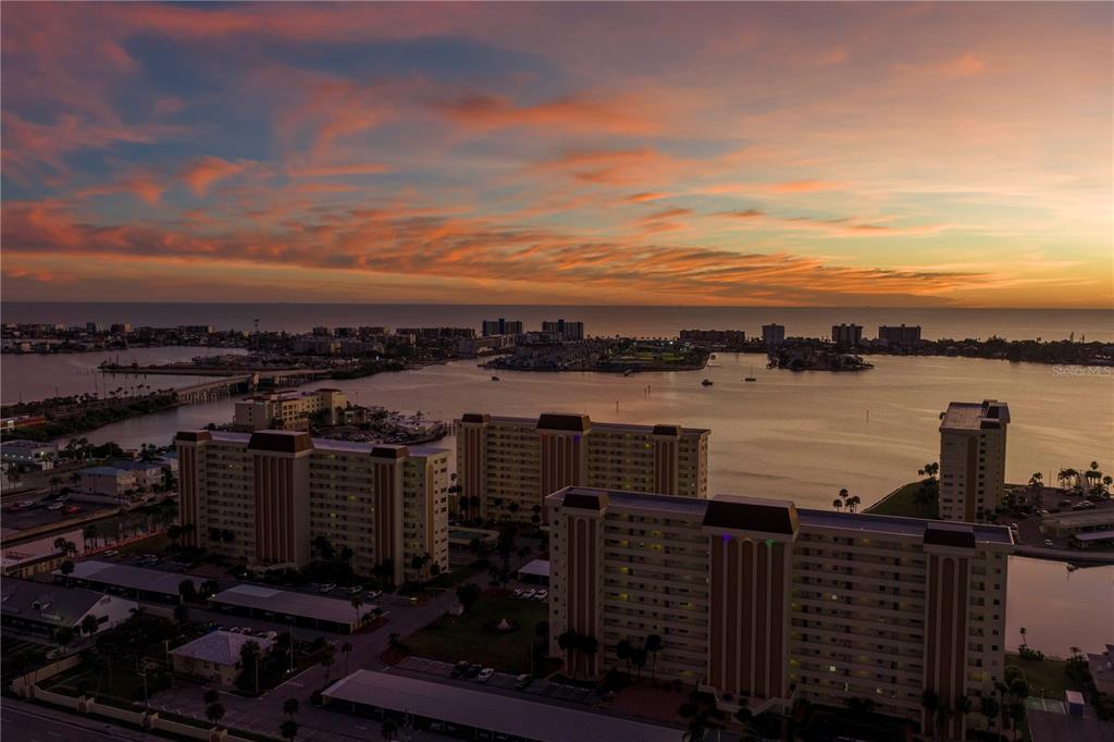 4525 Cove Circle, Unit 102 St. Petersburg, FL 33708 - Photo 40 of 73 a view of a lake and city