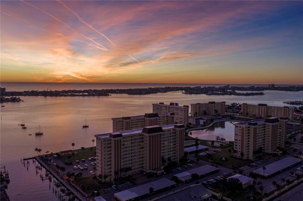 4525 Cove Circle, Unit 102 St. Petersburg, FL 33708 - Photo 43 of 73 a view of a lake with a terrace