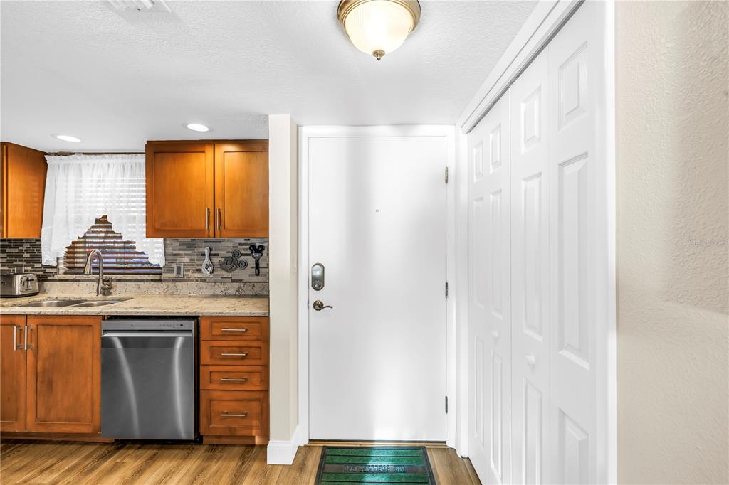 4525 Cove Circle, Unit 102 St. Petersburg, FL 33708 - Photo 8 of 73 a bathroom with a sink and a mirror