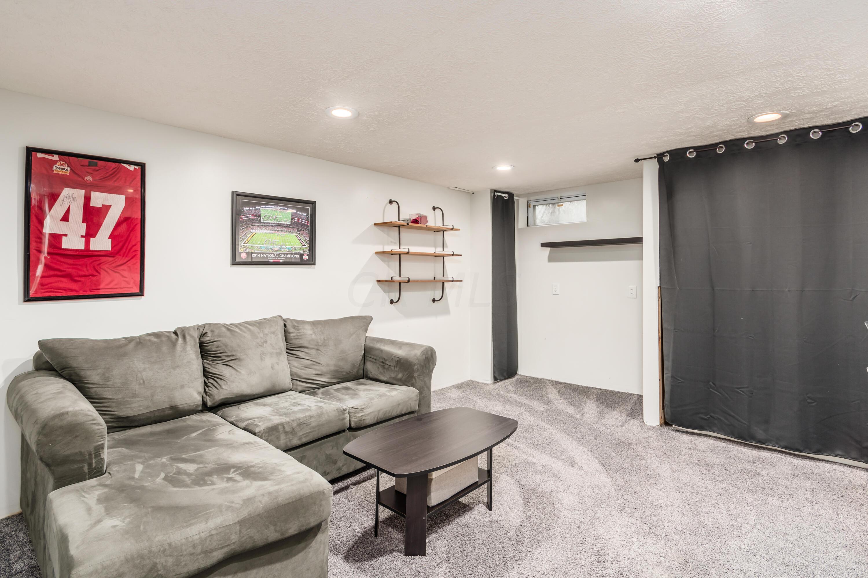 565 Marcum Road Blacklick, OH 43004 - Photo 19 of 29 Beautifully finished basement makes a great family area