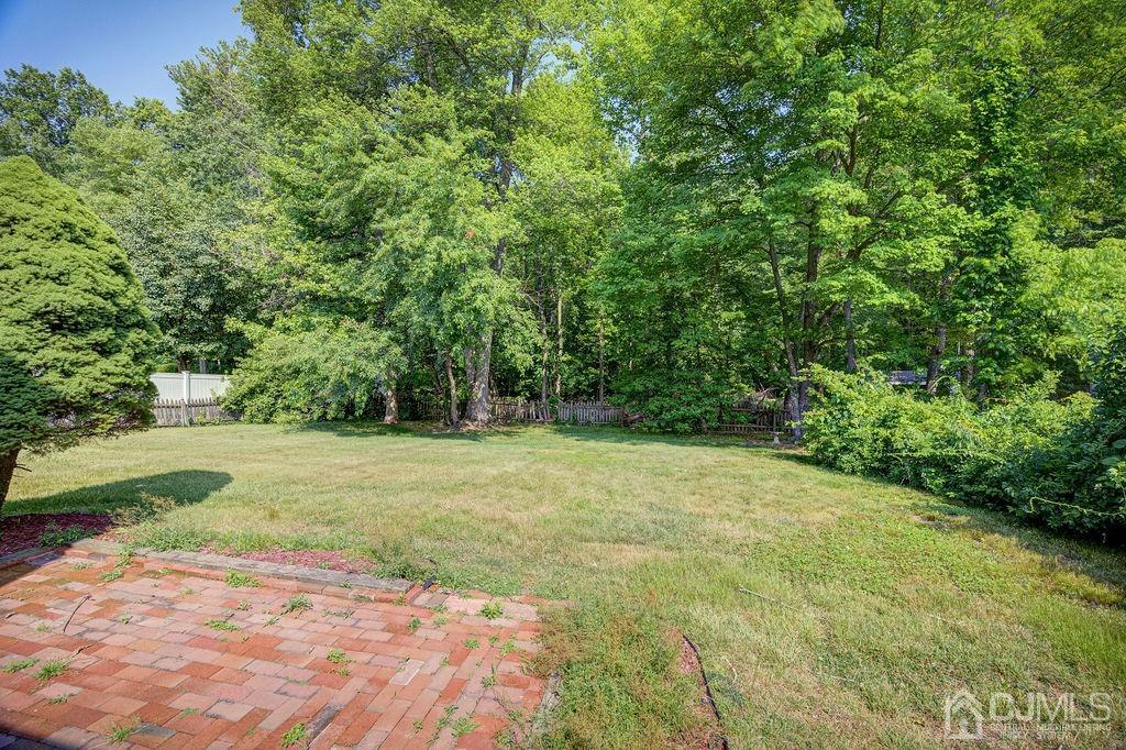 16 Oak Tree Road Monmouth Junction, NJ 08852 - Photo 22 of 29 a view of a yard with a trees