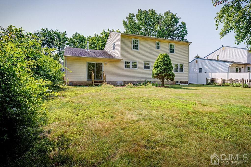 16 Oak Tree Road Monmouth Junction, NJ 08852 - Photo 25 of 29 a view of a house with a yard