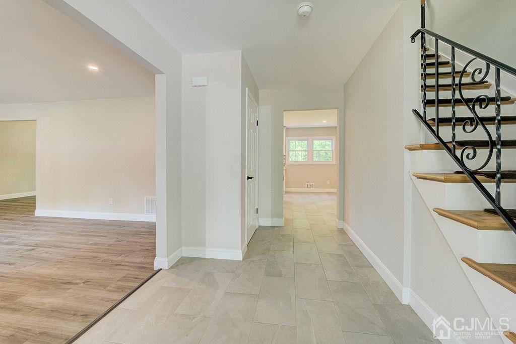 16 Oak Tree Road Monmouth Junction, NJ 08852 - Photo 7 of 29 wooden floor with a window