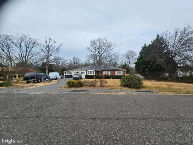 a view of street with parked cars