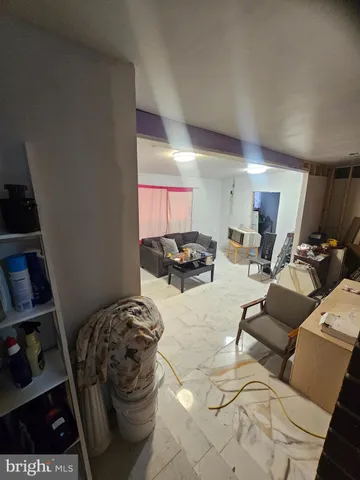 a room with furniture and wooden floor