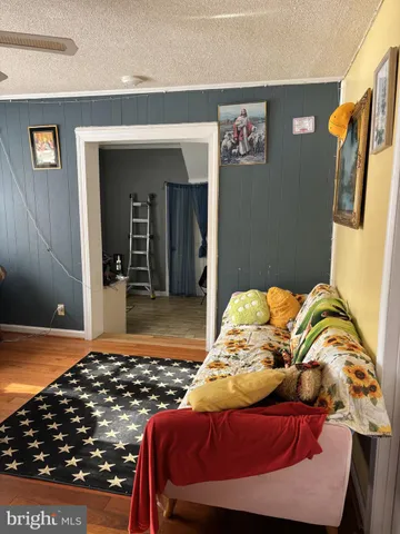 a bedroom with a bed and walk in closet