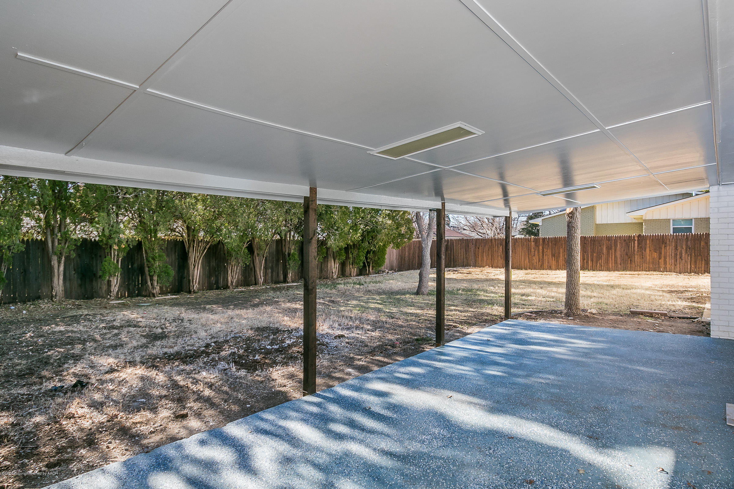 6113 Gainsborough Road Amarillo, TX 79106 - Photo 22 of 26 a view of a backyard