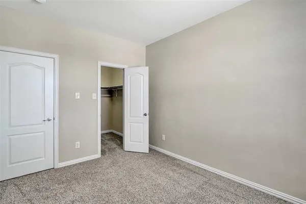 an empty room with closet