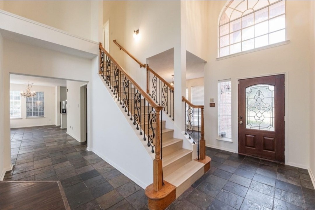 2515 Falcon Ridge Street Pearland, TX 77584 - Photo 5 of 31 a view of entryway and hall with a front door