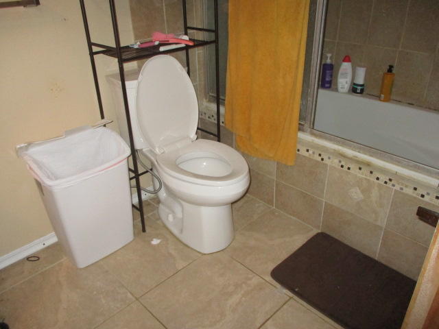16728 78th Road North Loxahatchee, FL 33470 - Photo 15 of 23 a bathroom with a toilet and a sink