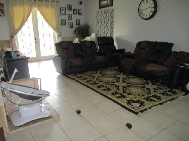 16728 78th Road North Loxahatchee, FL 33470 - Photo 4 of 23 a living room with furniture