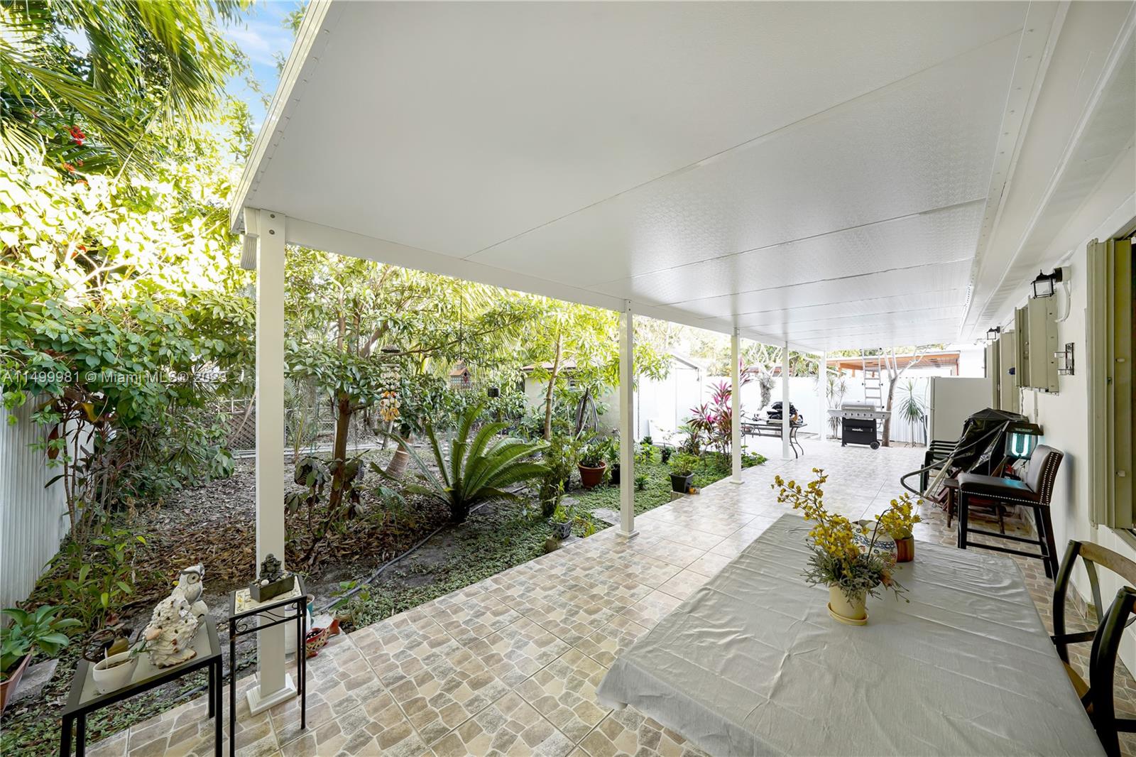 2755 Southwest 33rd Court Miami, FL 33133 - Photo 16 of 22 a view of a porch with chairs