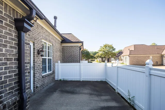 a view of a house with a street