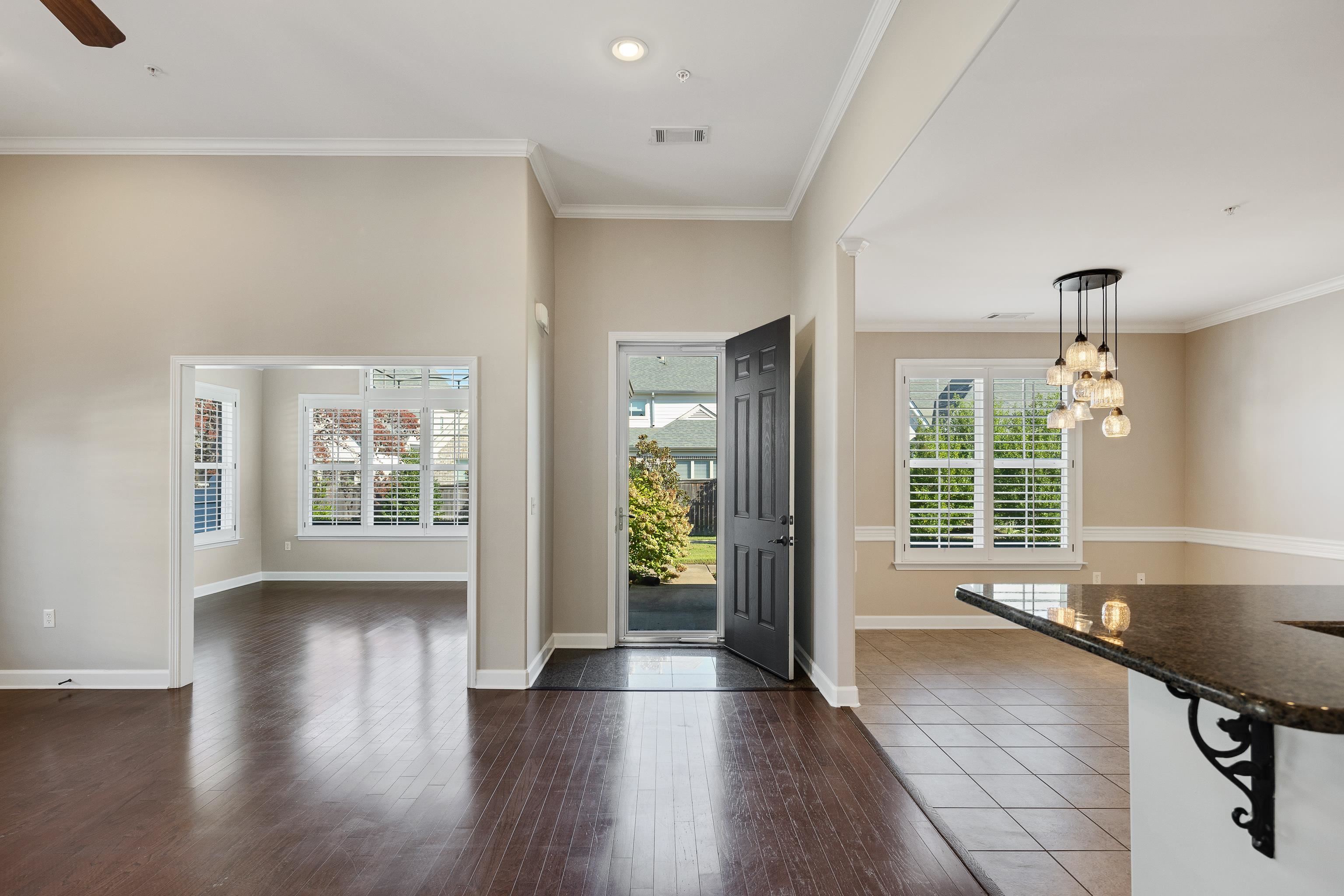 1422 Calumet Farms Drive, Unit 7 Collierville, TN 38017 - Photo 6 of 29 a view of a room with window and wooden floor