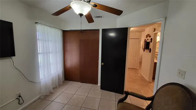 a view of an entryway with a fan