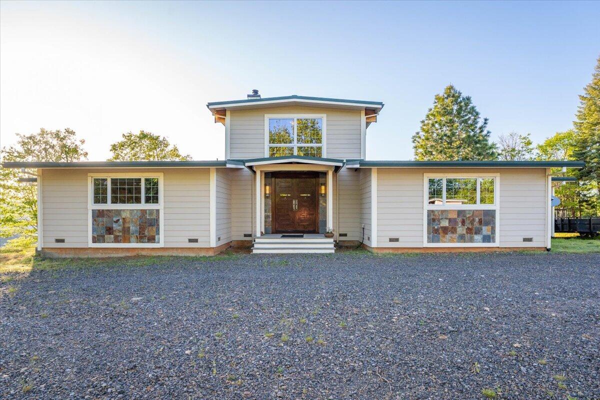 19649 Cove Road Montgomery Creek, CA 96065 - Photo 4 of 65 front view of a house with a porch