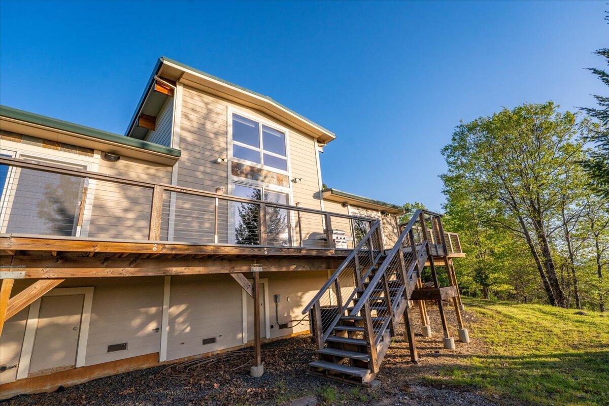 19649 Cove Road Montgomery Creek, CA 96065 - Photo 46 of 65 a view of a house with a yard
