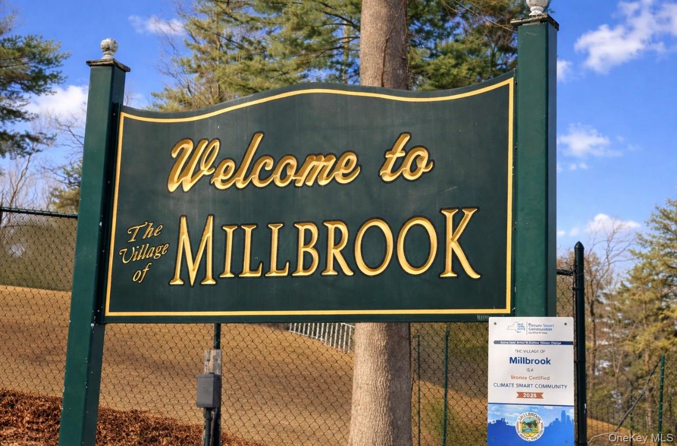 66 County House Road Millbrook, NY 12545 - Photo 5 of 6 a sign broad on a wooden wall