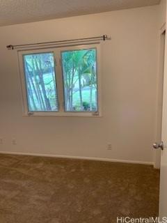 45-906 Anoi Road, Unit A Kaneohe, HI 96744 - Photo 17 of 19 a view of a room with a window