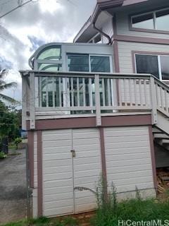 45-906 Anoi Road, Unit A Kaneohe, HI 96744 - Photo 2 of 19 a front view of a house with a balcony