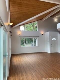 45-906 Anoi Road, Unit A Kaneohe, HI 96744 - Photo 5 of 19 a view of an empty room with wooden floor and a window
