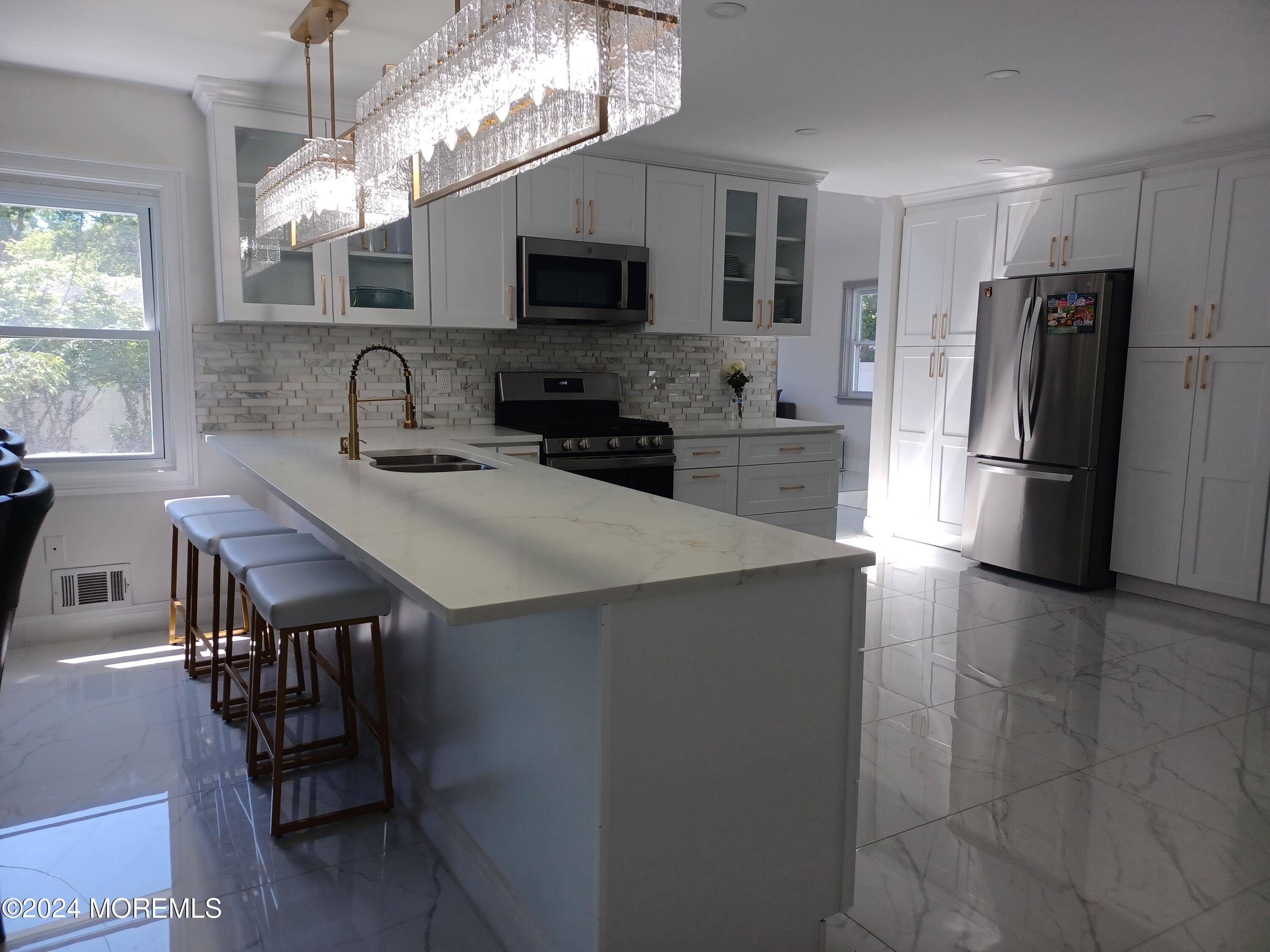 240 Woodcrest Road Oakhurst, NJ 07755 - Photo 2 of 12 20240702_114042